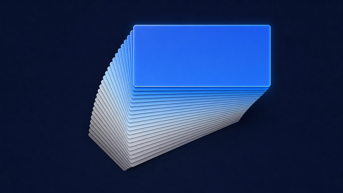 A fanned stack of about twenty blank video frame cards, dull and crooked at the bottom and crisp and glowing at the top