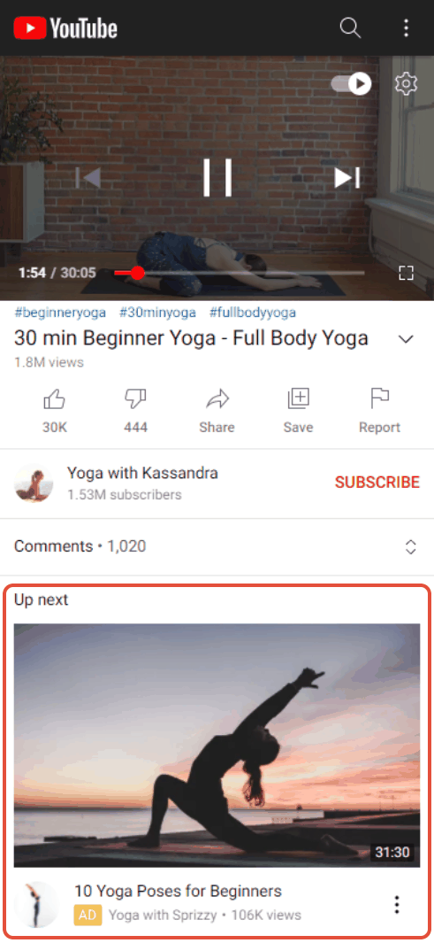 A YouTube watch page on a phone with the Up next panel outlined, where the first suggested video carries an Ad label